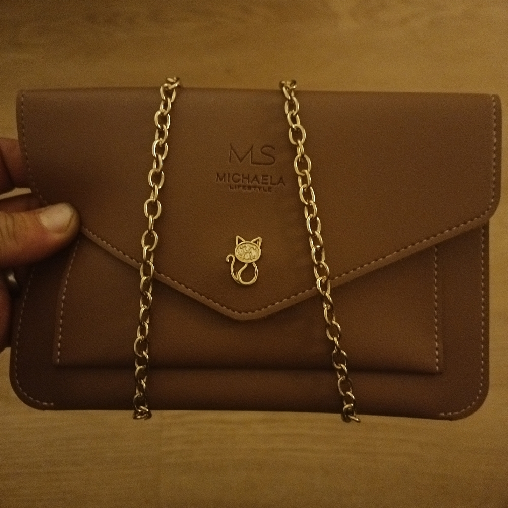 Michaela hand clutch